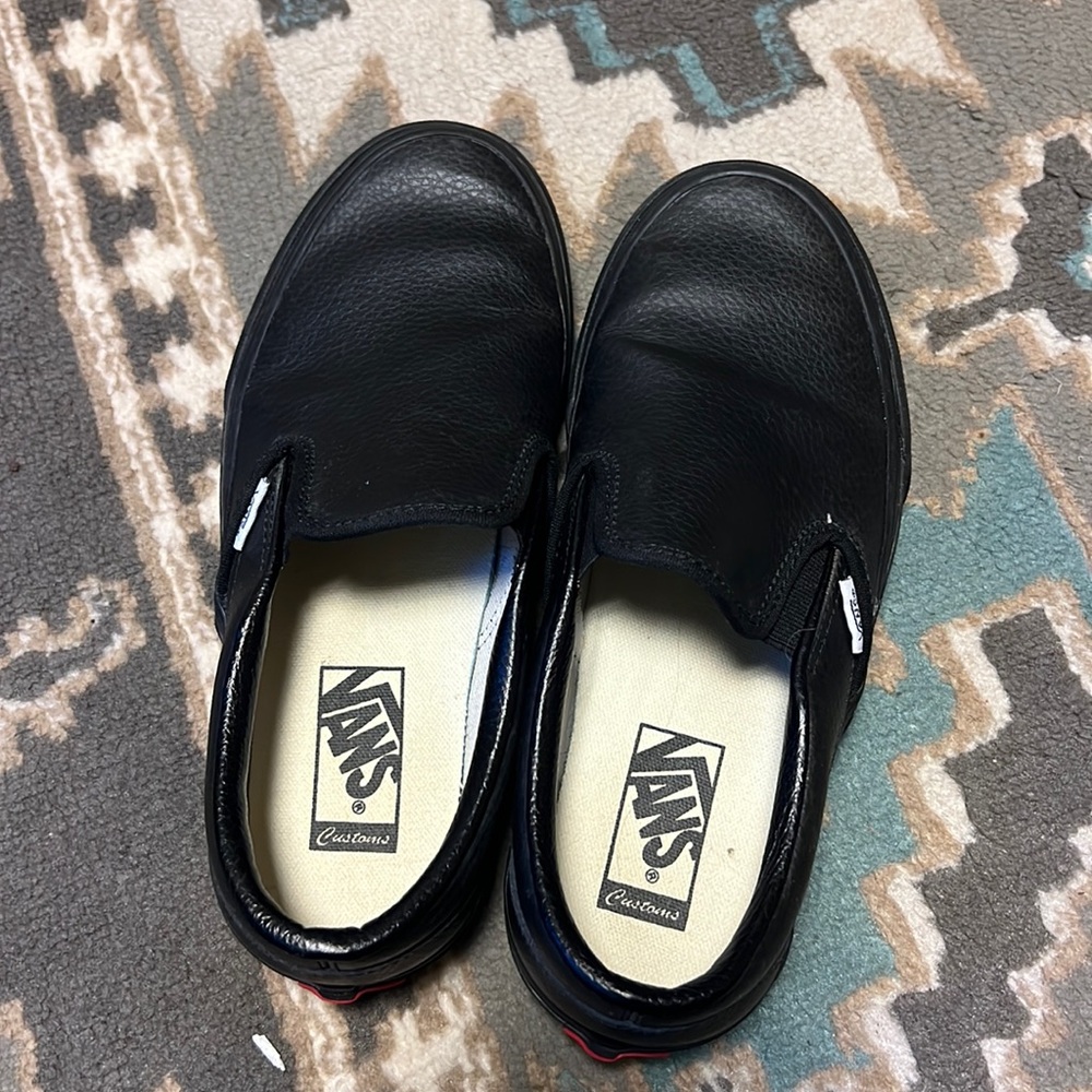 Black leather vans
